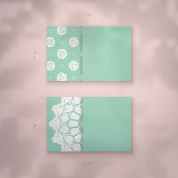 Tarjeta de visita en color menta con adorno mandala blanco para tu negocio.