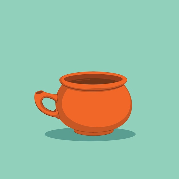 Una taza de arcilla llena de una bebida caliente