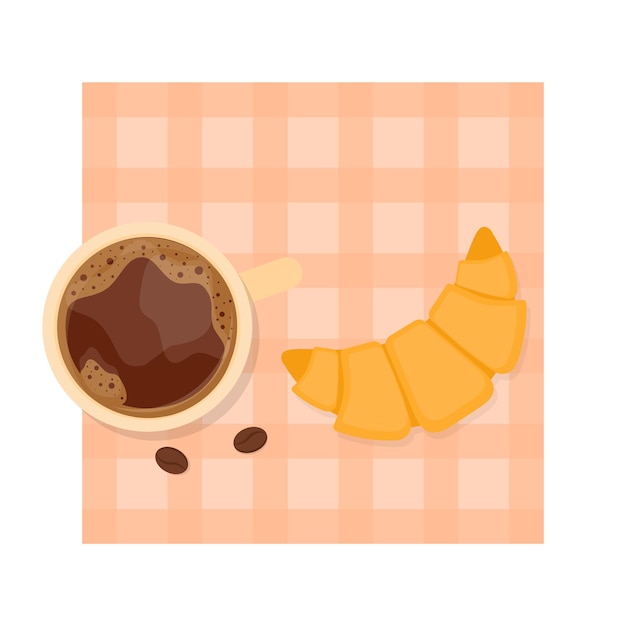 Taza de café y croissant