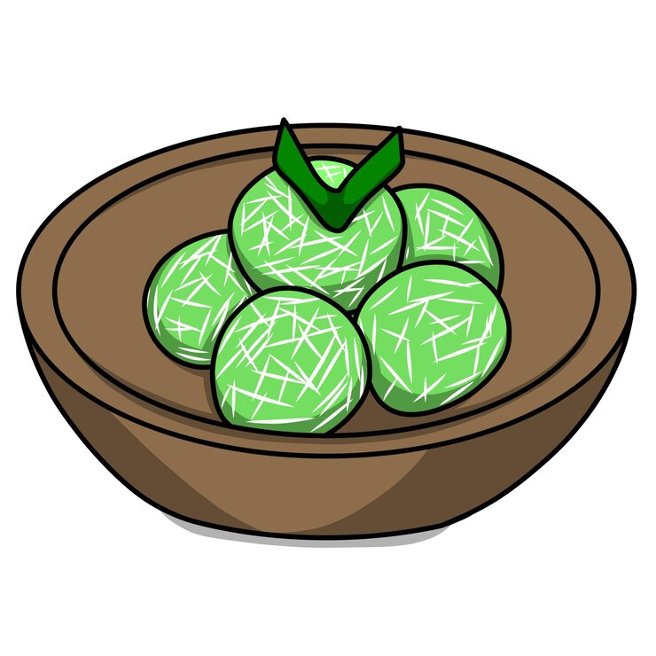 un tazón de bolas verdes o klepon con un diseño verde en la parte inferior