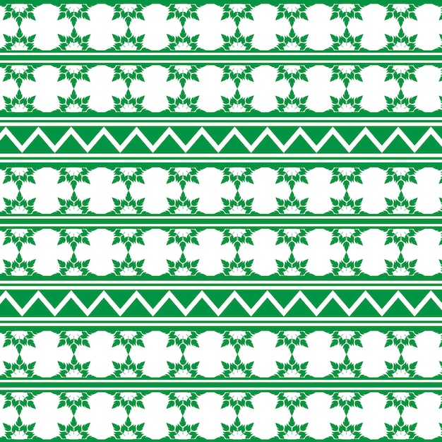 Tejido tradicional tribal batik etnico ikat floral patrón sin costuras hojas verdes vector geométrico