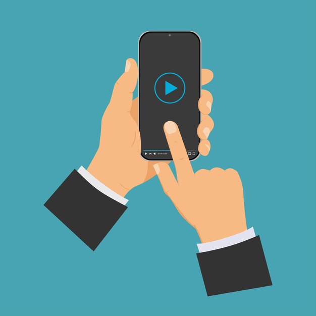Teléfono con video en línea en manos del hombre.