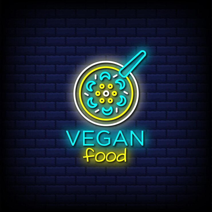 Vector texto de estilo de letreros de neón de comida vegana