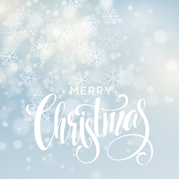Texto de letras manuscritas de Navidad sobre fondo borroso con luces.