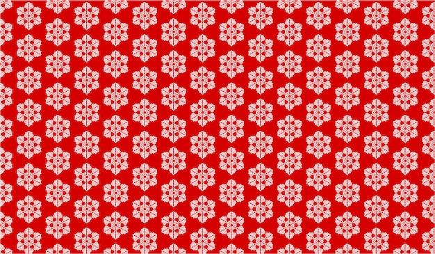Textura con copos de nieve sobre un fondo rojo