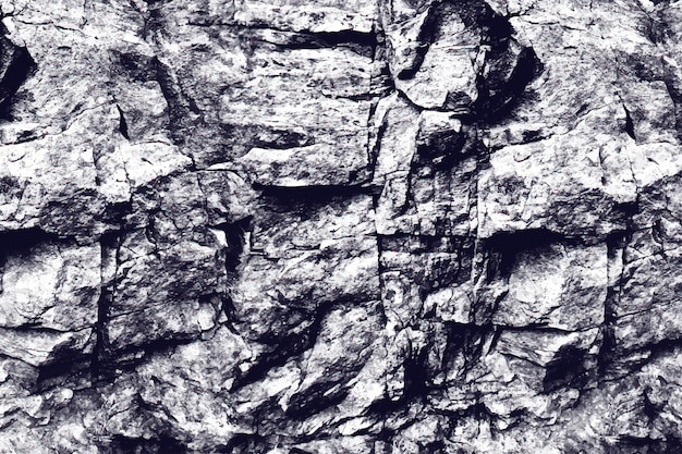 Textura de la pared de piedra de fondo Fragmento de pared con arañazos y grietas grunge