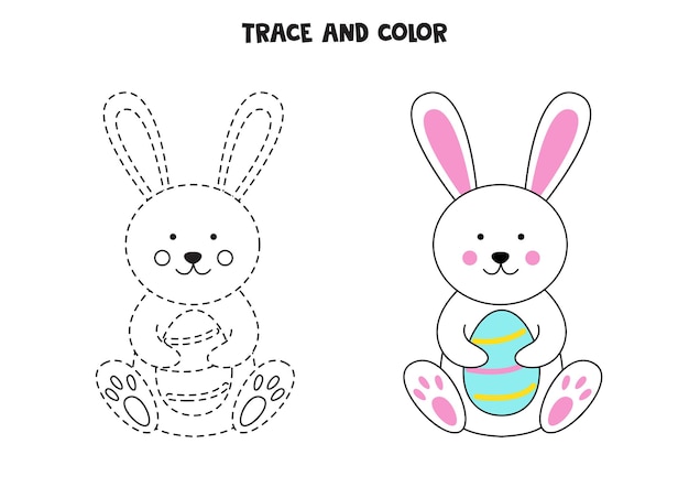 Traza y colorea el lindo conejito de Pascua sosteniendo un huevo. Hoja de trabajo para niños.