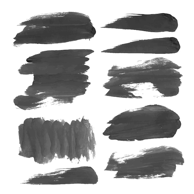 Trazos realistas pintados con pintura negra aislada en un fondo blanco 1
