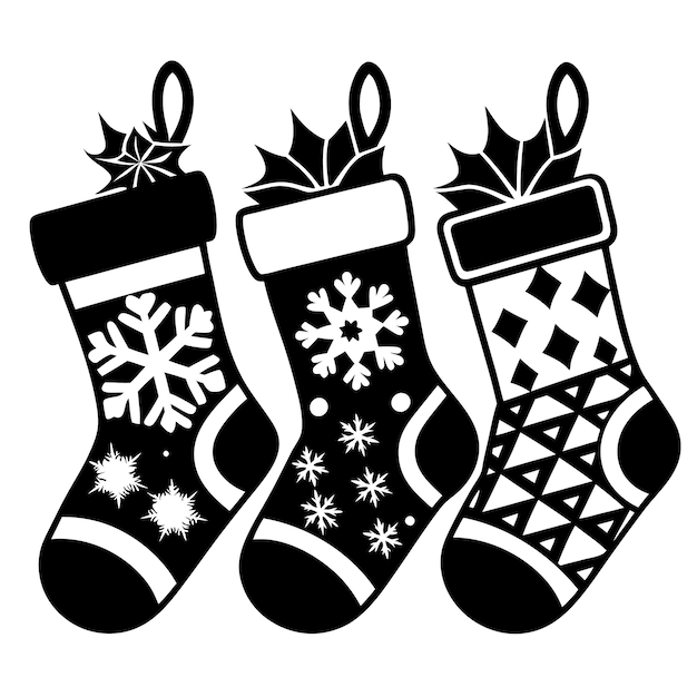 tres calcetines de Navidad con copos de nieve en ellos y uno de ellos tiene una estrella en la parte inferior