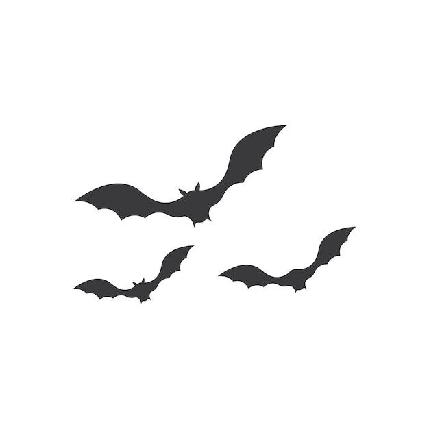 Tres siluetas de murciélagos volando