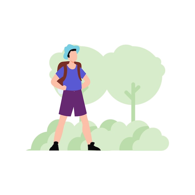 El turista está de pie en el bosque.