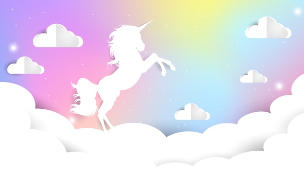 Unicornio papel cortado en el cielo pastel