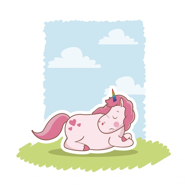 Unicornio rosa durmiendo sobre el prado