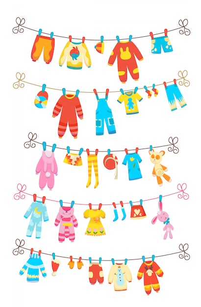 Varios artículos de ropa de bebé en cuerda