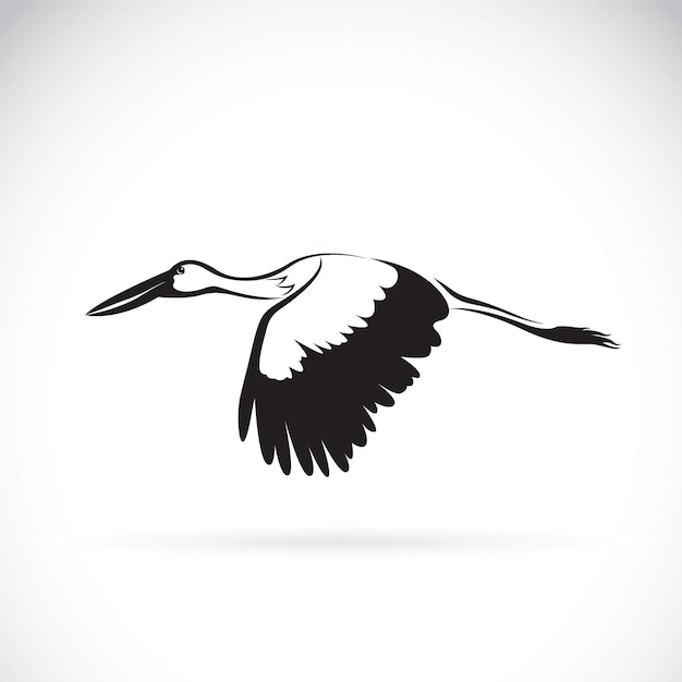 Vector de cigüeña volando sobre fondo blanco. icono de cigüeña. diseño de aves.