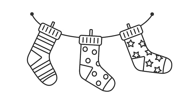 Vector ilustración en blanco y negro calcetines de Navidad para niños