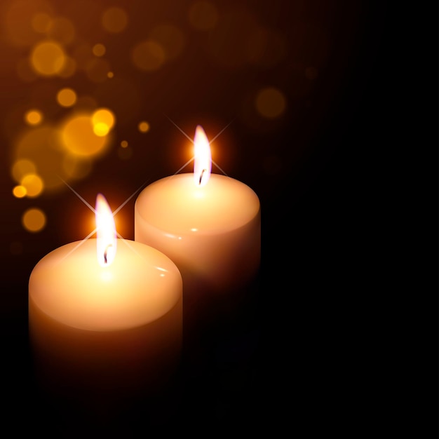 velas parpadeantes sobre un fondo oscuro