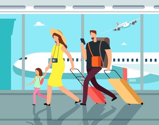 Viajando en familia con equipaje en la terminal del aeropuerto.
