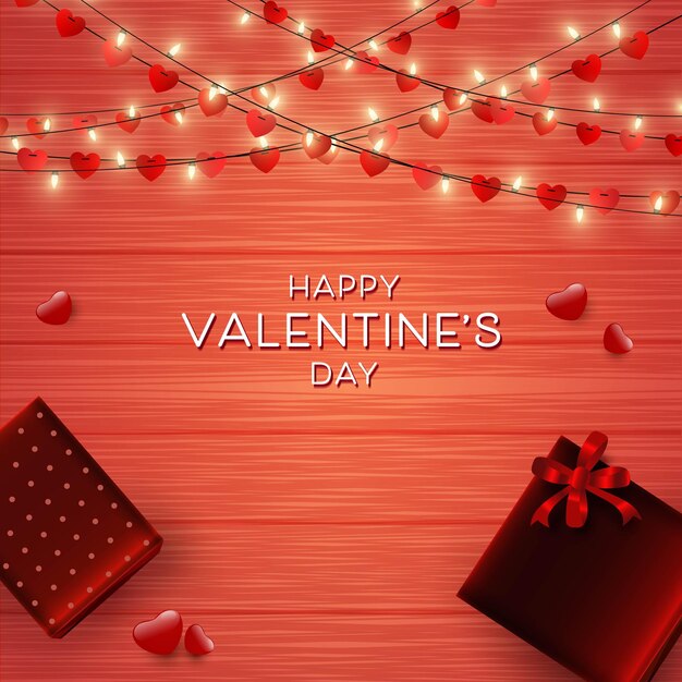 Vista superior de la caja de regalos de elegancia en la mesa con corazones rojos e iluminan la decoración de luces de cuerda para el concepto de feliz día de san valentín
