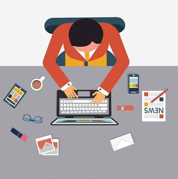 Vista superior del escritorio de trabajo, hombre que trabaja en el escritorio.
