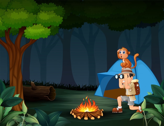 Zookeeper boy y su mono acampando en el bosque