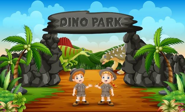 Zookeeper niño y niña en la entrada del parque dino