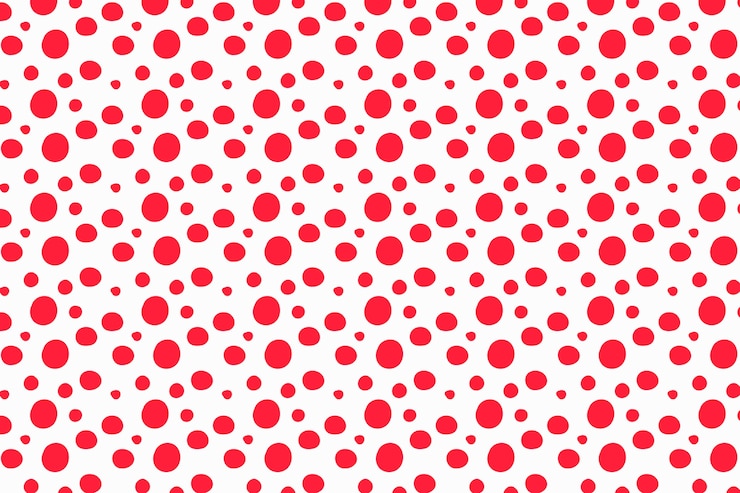 Vector Gratis desain titik polka merah yang digambar tangan