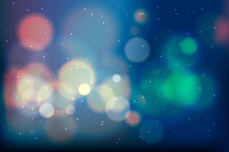 Vector Gratis gradient wallpaper with bokeh effect