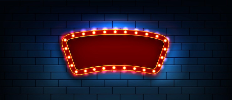Vector Gratis red frame with light bulbs on dark blue brick wall