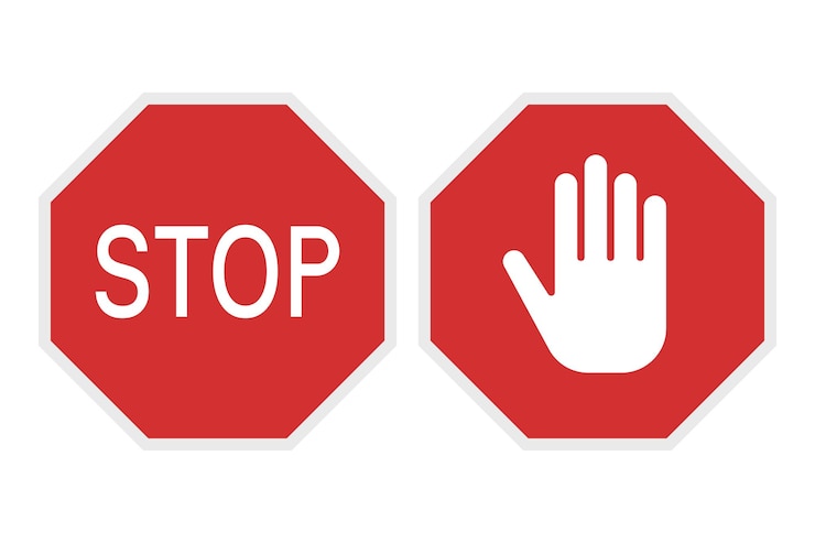 Vector Gratis red stop signs set of two