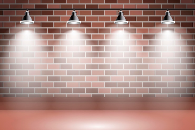 Vector Gratis spot lights background on brick wall