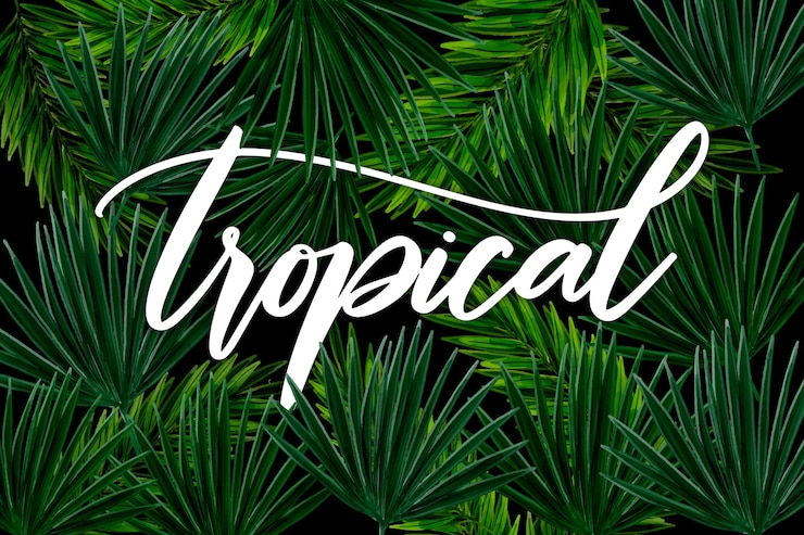 Vector Gratis tropical lettering with leaves or flowers