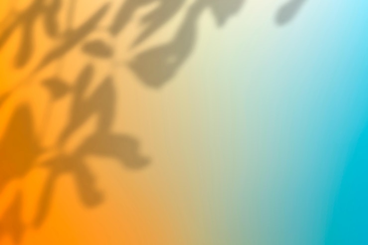 Vector Gratis vektor latar belakang gradien warna-warni dengan bayangan daun