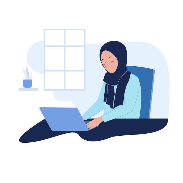A muslim woman wearing hijab working on a laptop