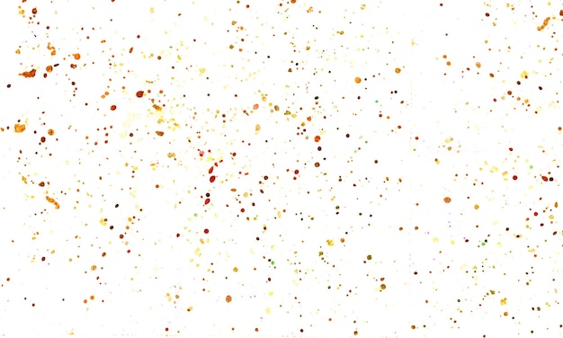 A white background with orange and yellow splatter paint splatters.
