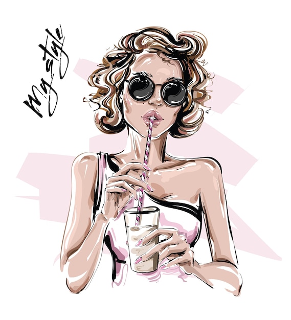 Beautiful young woman holding juice cup