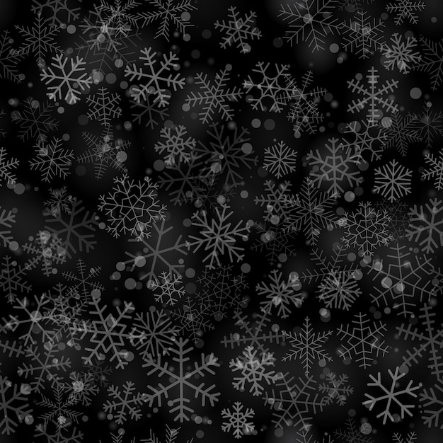 christmas seamless pattern of snowflakes of different shapes sizes and transparency on black background