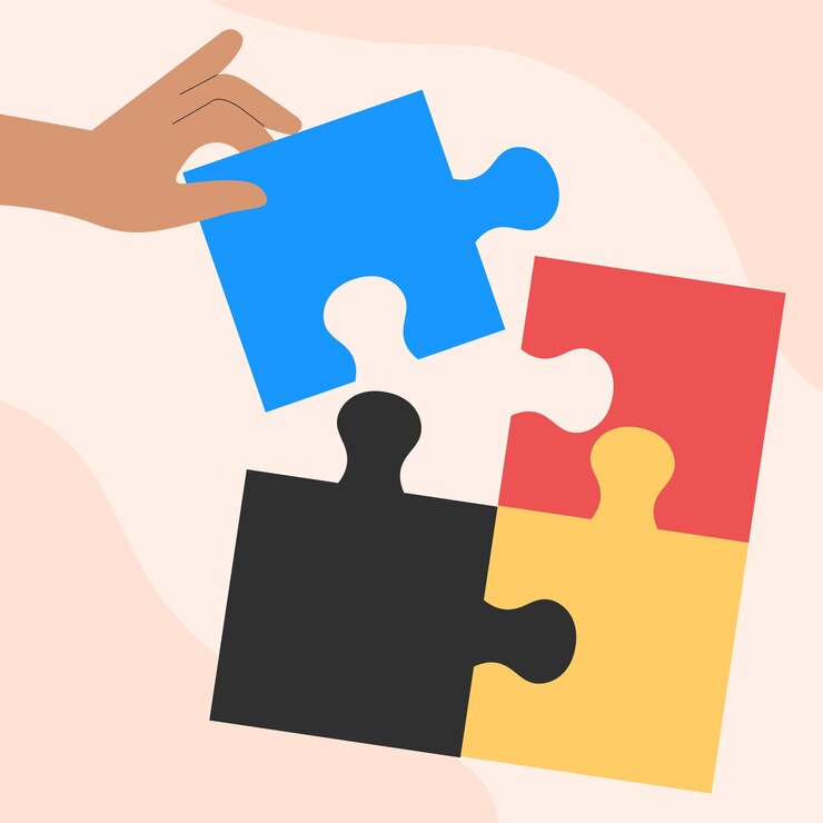 hand holding puzzle piece