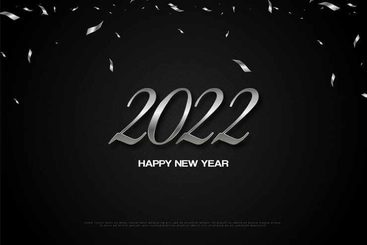 happy new year 2022 with ribbon pieces flying above