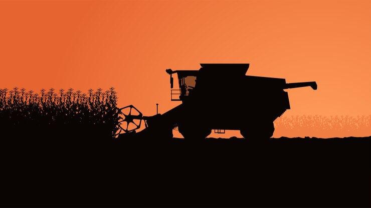 Illustration of side view harvester with plants on orange sky