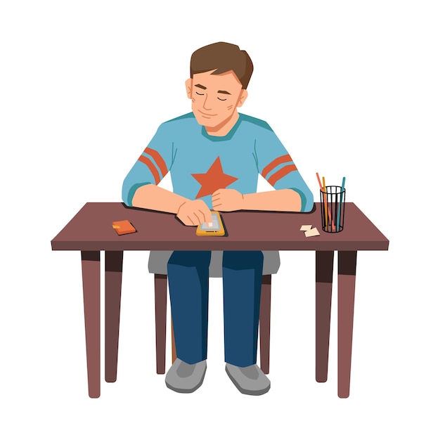 Male pupil sitting at table and browsing smartphone isolated young boy with modern gadget