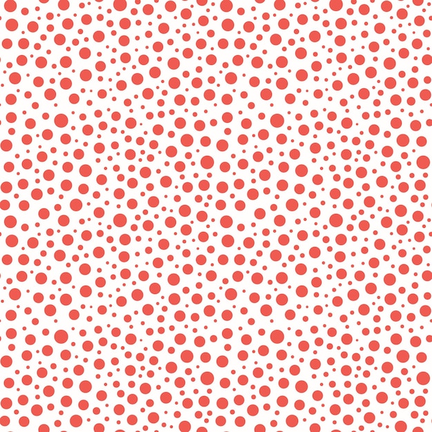 Seamless vector pattern in polka dot style Chaotic many red circles on a light background