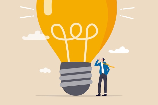 think big, aspiration to win and success in business, big idea from creativity and imagination to overcome fear concept, smart businessman entrepreneur thinking with big oversized idea lightbulb.