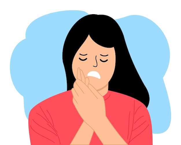 young woman feeling pain holding his cheek with both hands suffering from bad toothache painful