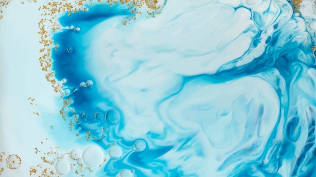 Abstraktes blaues Aquarell mit Goldglitterhintergrund