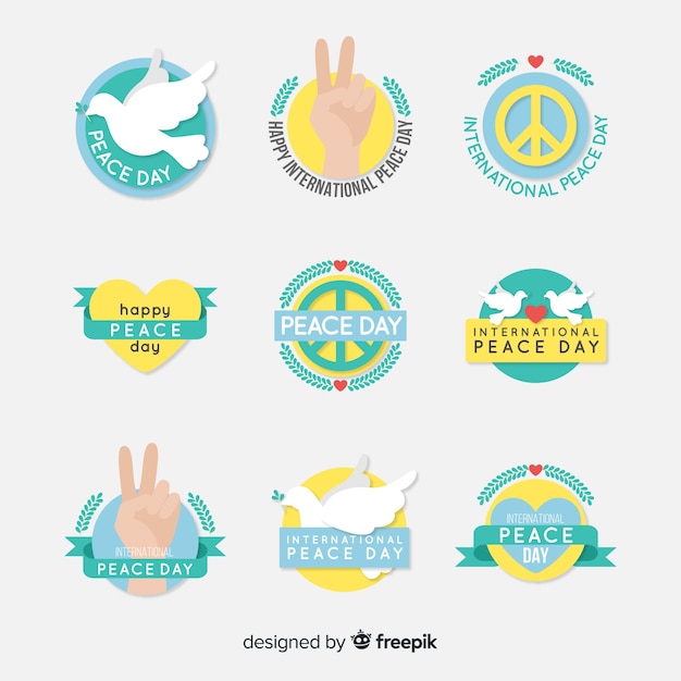 Kostenloser Vektor flaches design peace day label kollektion