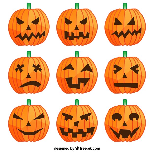 Halloween-Kürbisse mit verschiedenen Gesichtern
