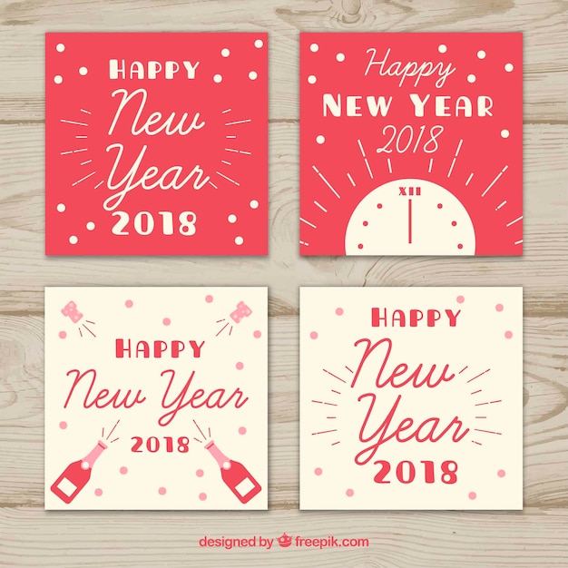 Handgezeichnete neujahrskarten in rot und beige