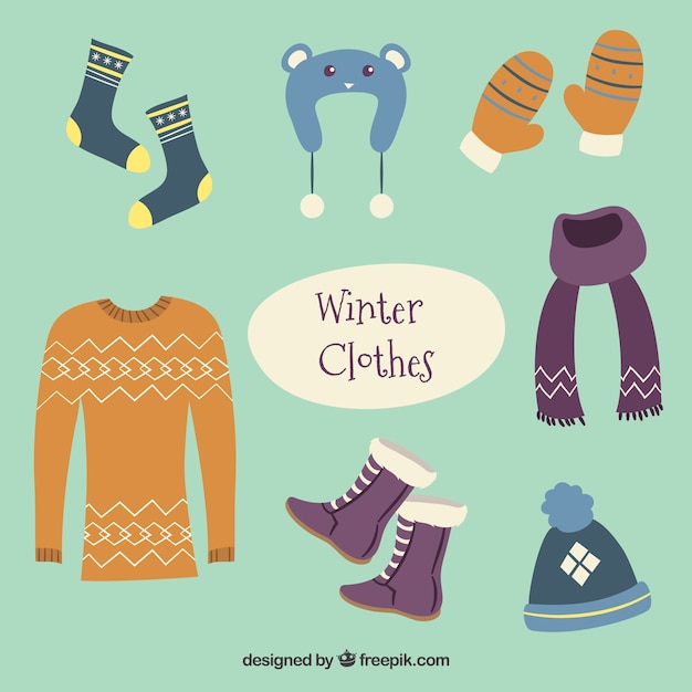 Kostenloser Vektor handgezeichnete winterkleidung & essentials