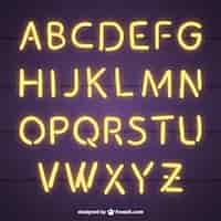 Kostenloser Vektor helle alphabet mit neonröhren